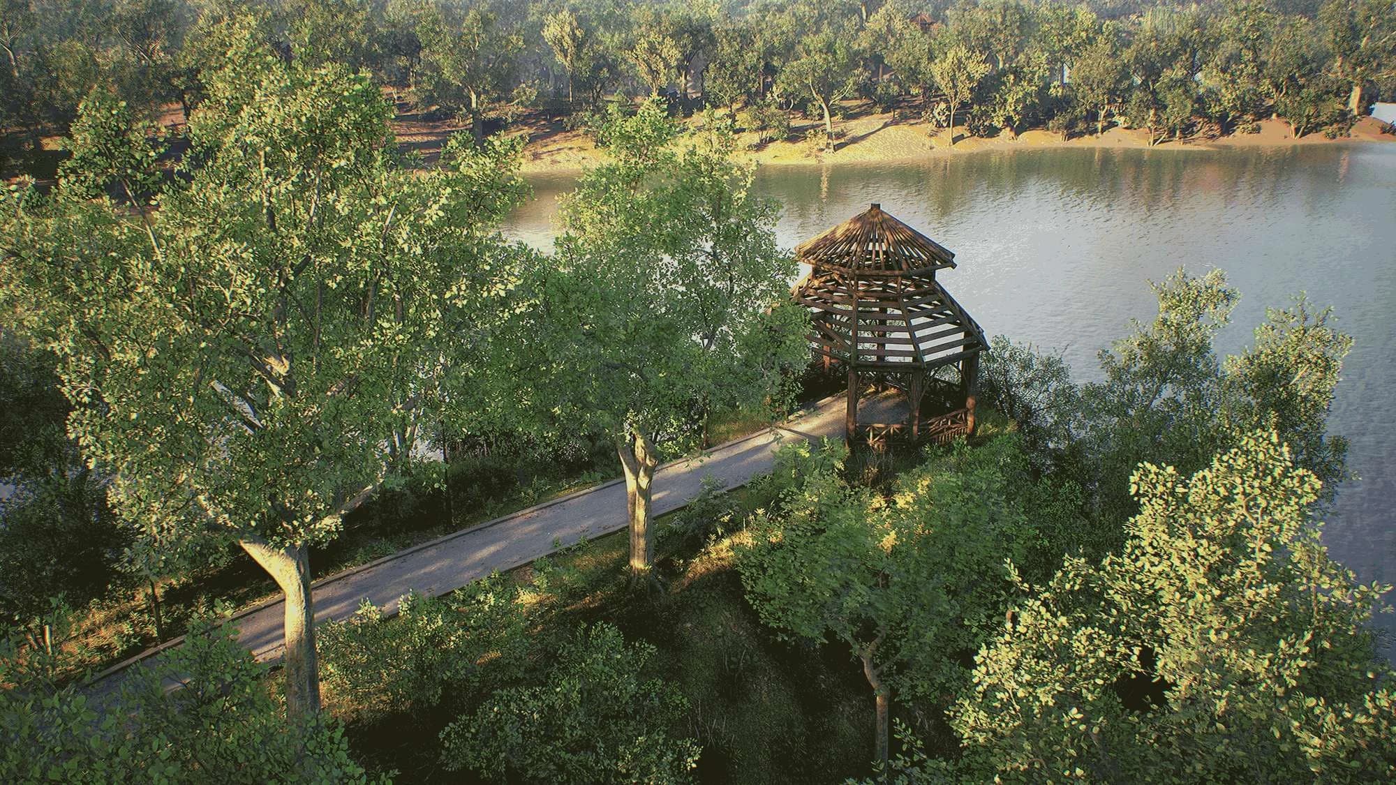 A wooden gazebo on the lakeshore, seen from above through the trees